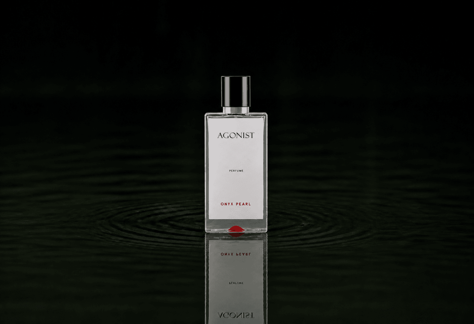 Agonist Onyx Pearl Perfume fragrance bottle floating above dark water