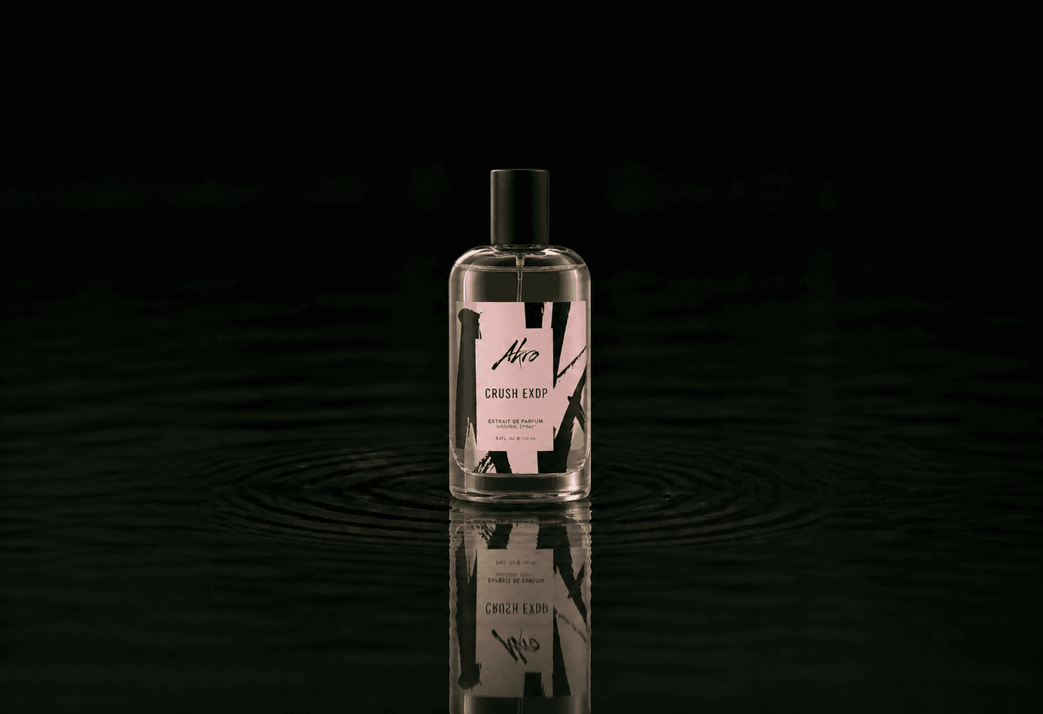 Akro Crush Exdp fragrance bottle floating above dark water
