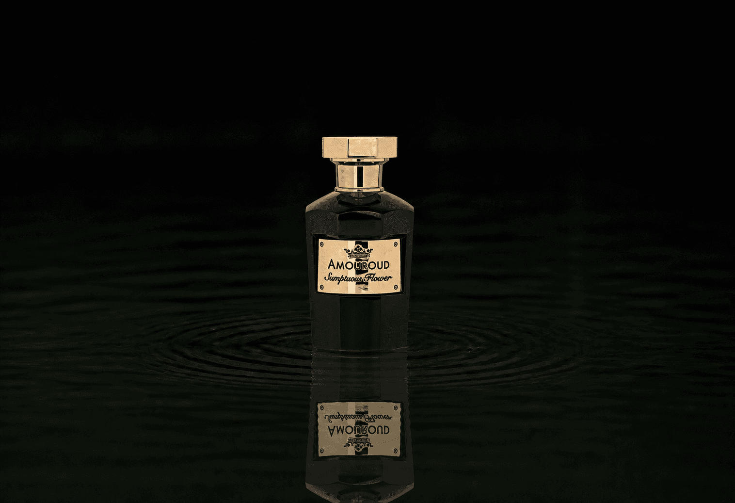 Amouroud Sumptuous Flower fragrance bottle floating above dark water