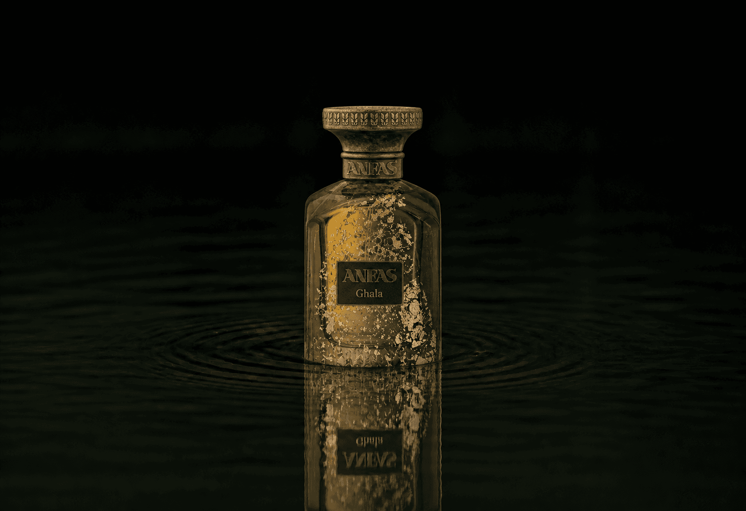 Anfas Ghala fragrance bottle floating above dark water