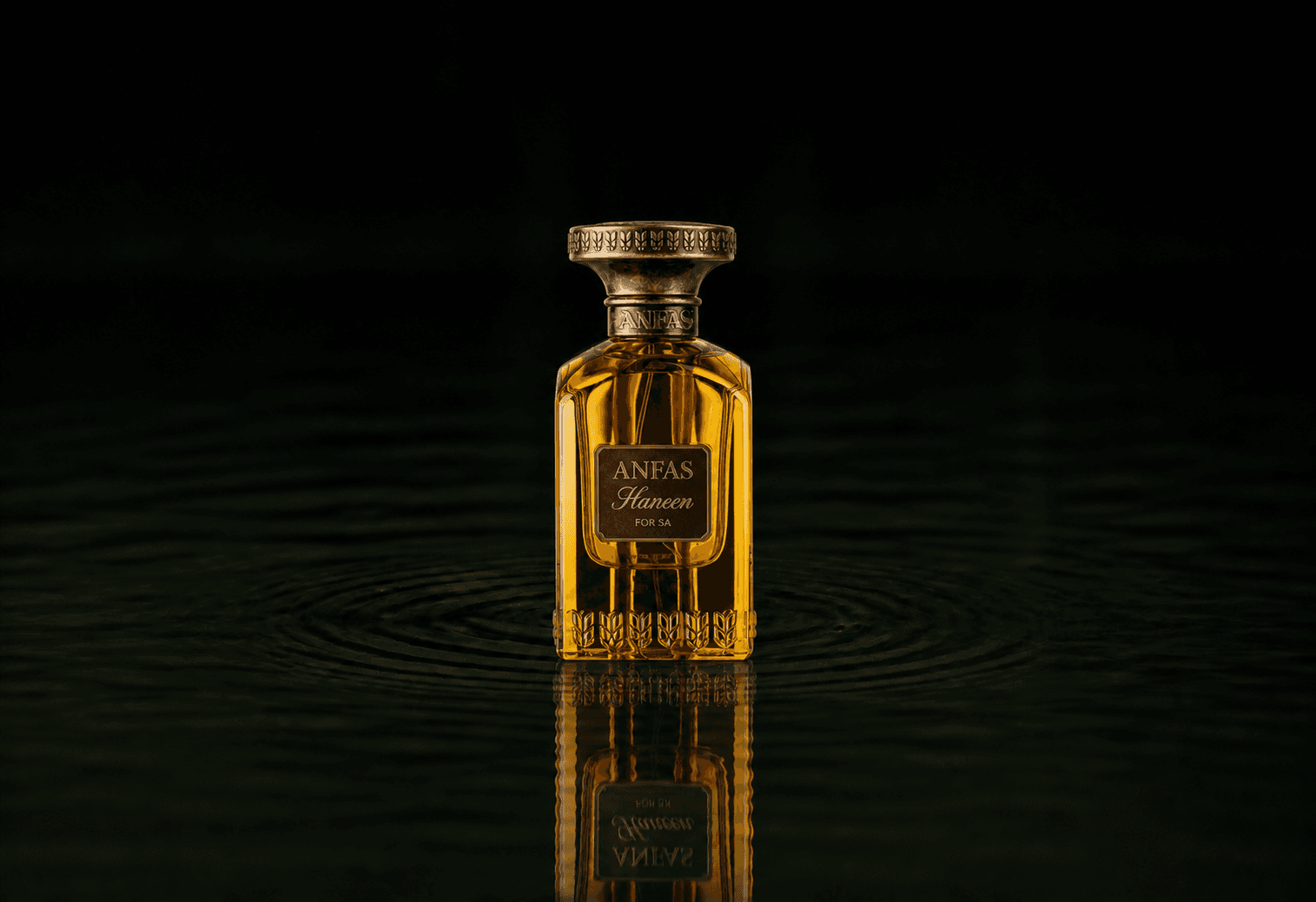 Anfas Haneen fragrance bottle floating above dark water