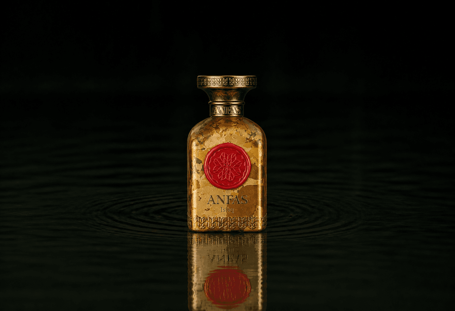 Anfas Ishq fragrance bottle floating above dark water