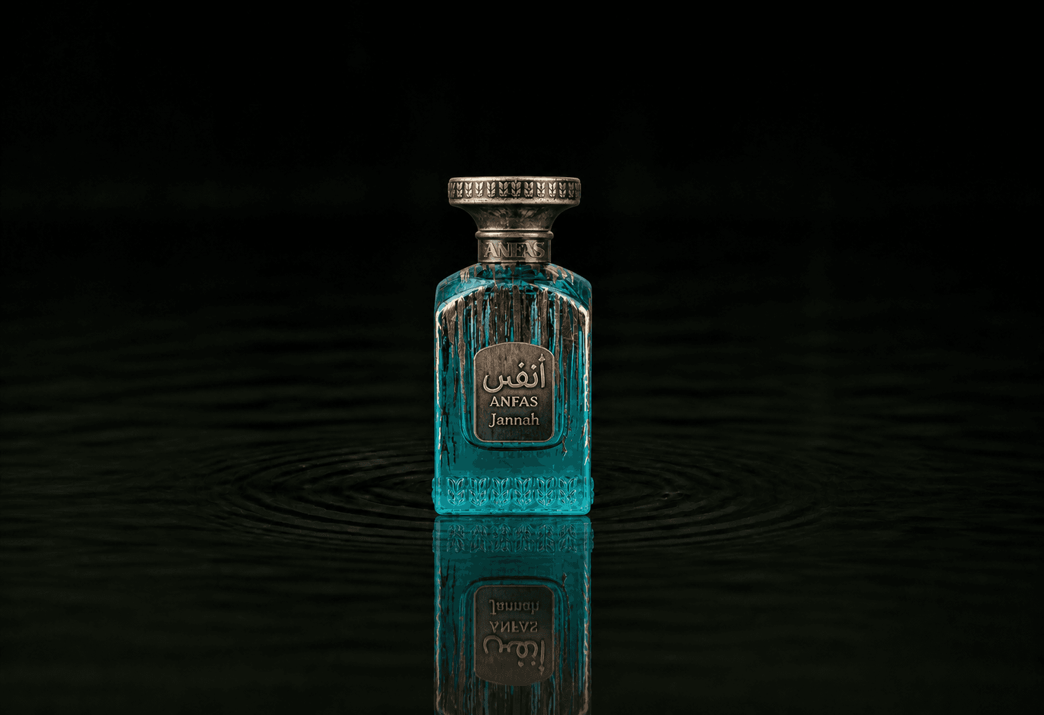 Anfas Jannah fragrance bottle floating above dark water