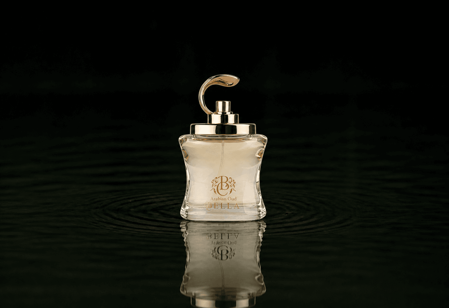 Arabian Oud Bella fragrance bottle floating above dark water