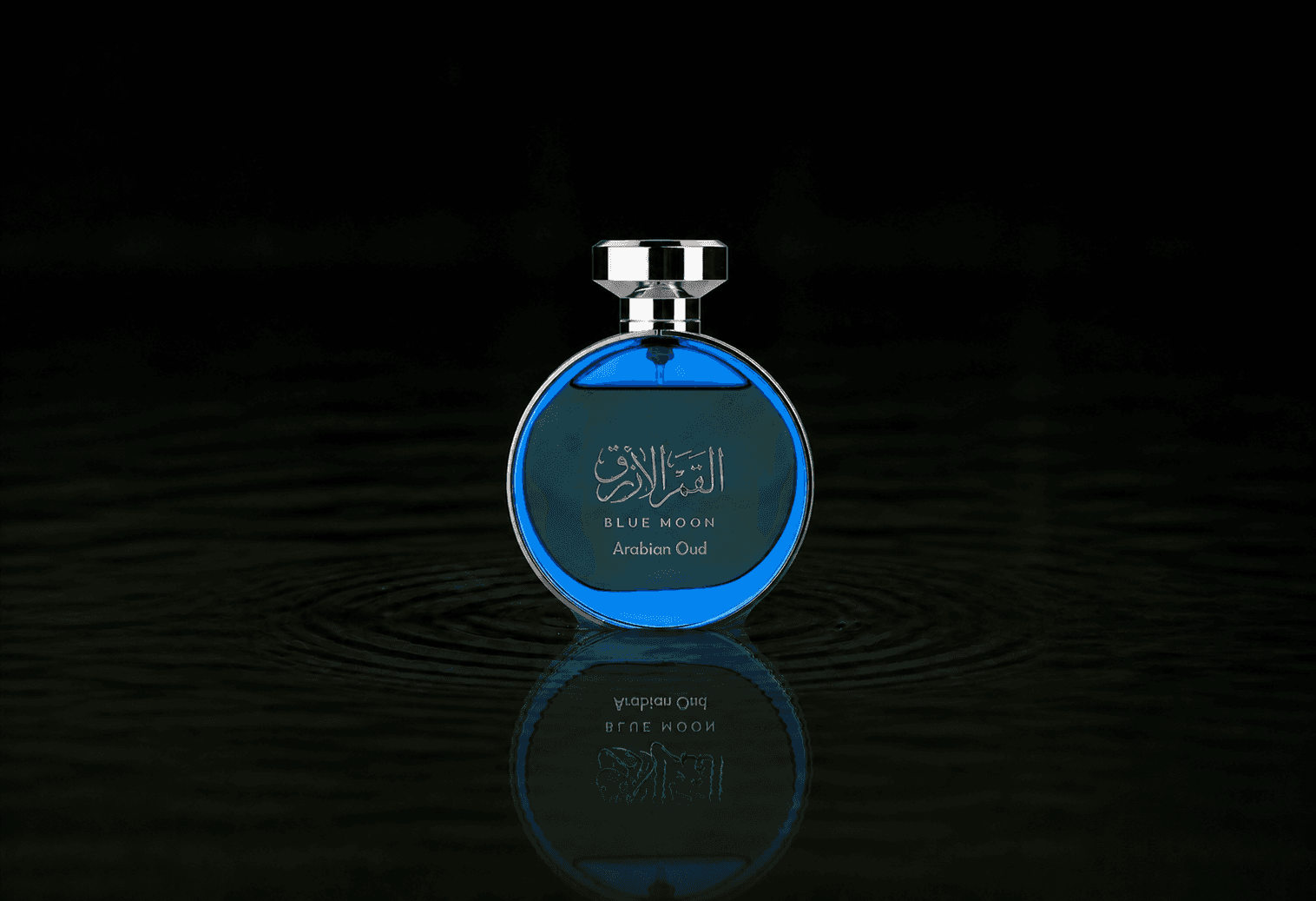 Arabian Oud Blue Moon fragrance bottle floating above dark water