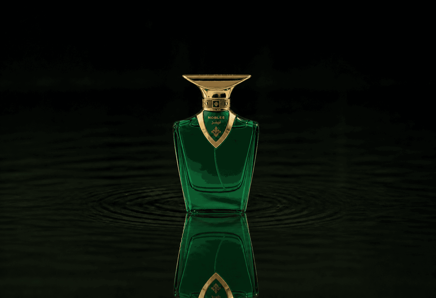 Arabian Oud Nobles fragrance bottle floating above dark water