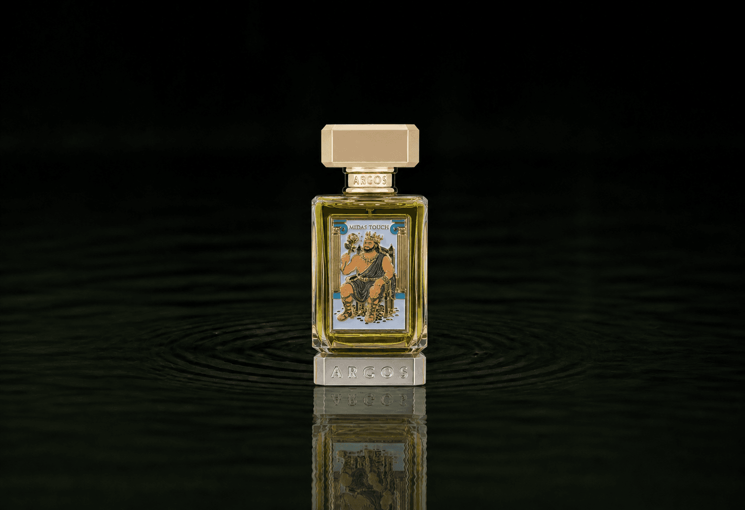 Argos Midas Touch fragrance bottle floating above dark water