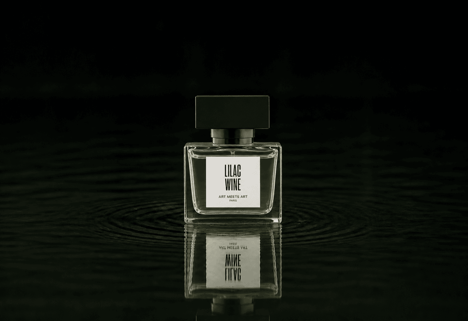 Art Meets Art Lilac Wine fragrance bottle floating above dark water