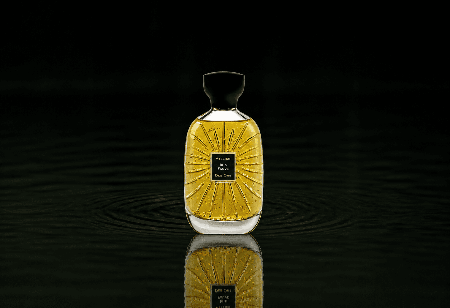 Atelier Des Ors Atelier Des Ors - Black Collection - Iris Fauve fragrance bottle floating above dark water