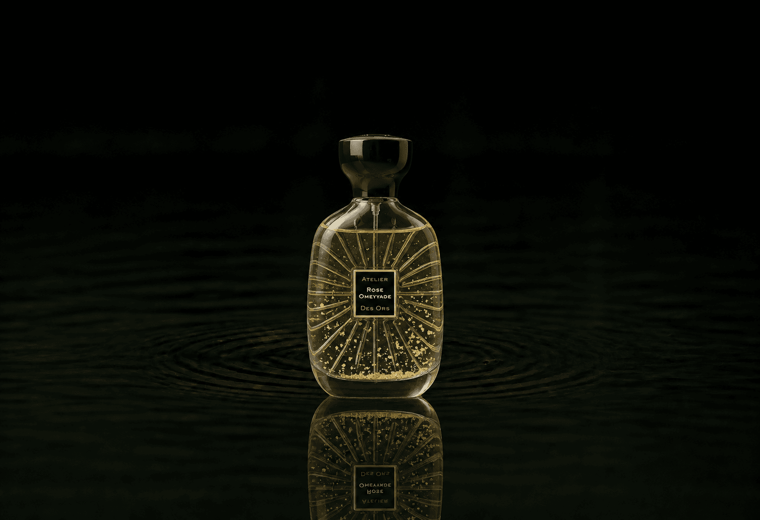 Atelier Des Ors Atelier Des Ors - Black Collection - Rose Omeyyade fragrance bottle floating above dark water