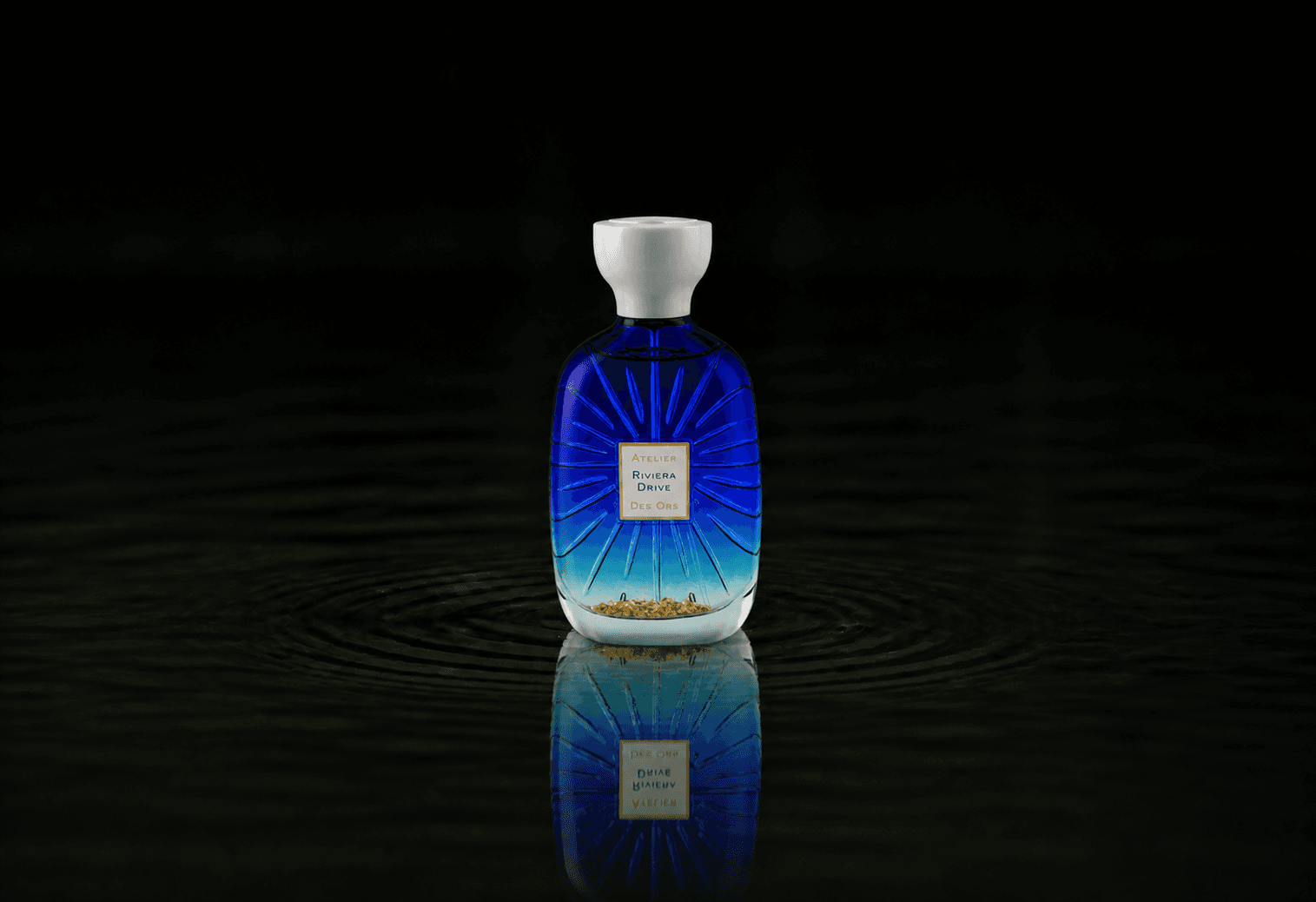 Atelier Des Ors Atelier Des Ors - Riviera Collection - Riviera Drive fragrance bottle floating above dark water