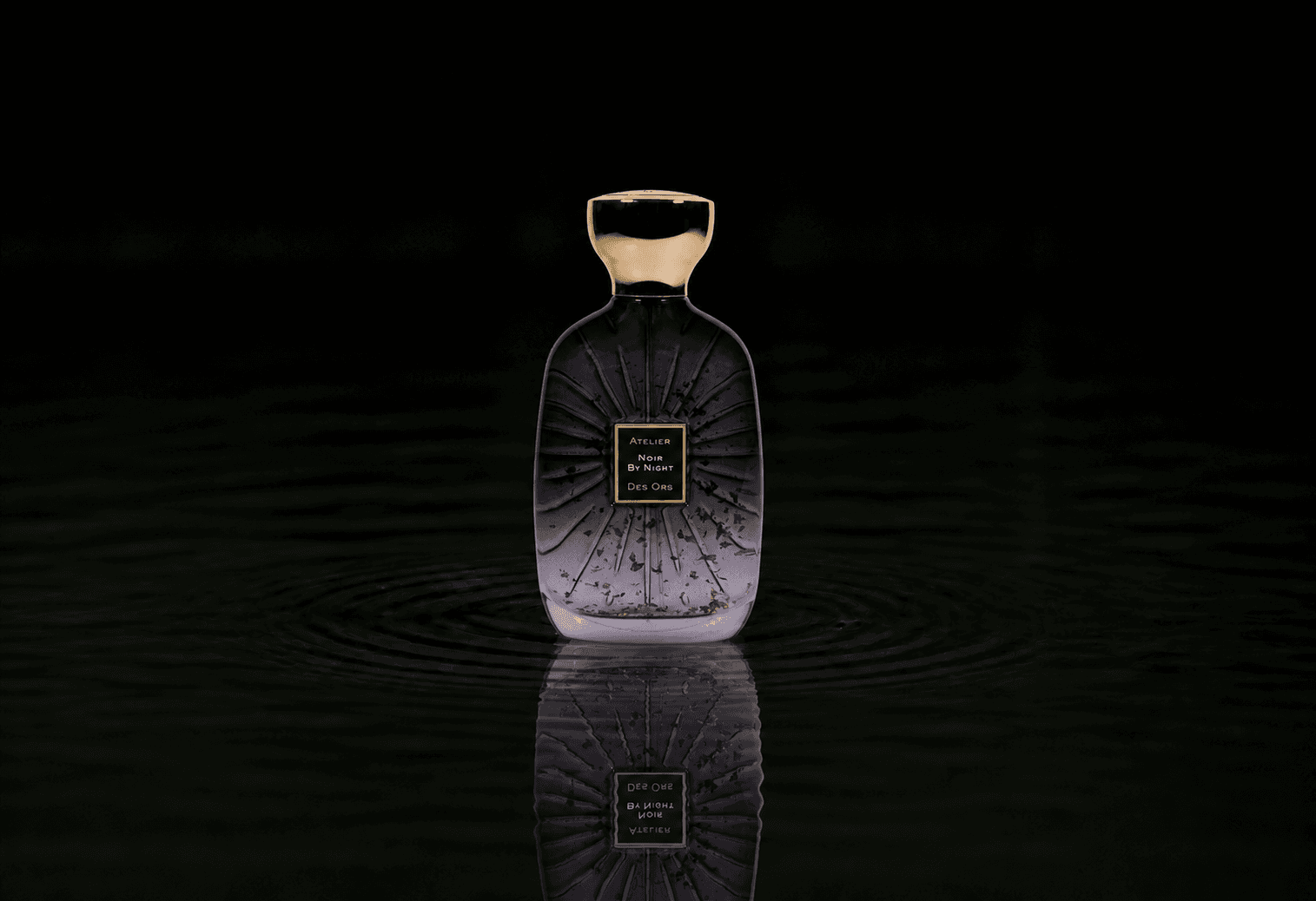 Atelier Des Ors Ateliers Des Ors - Noir By Night fragrance bottle floating above dark water
