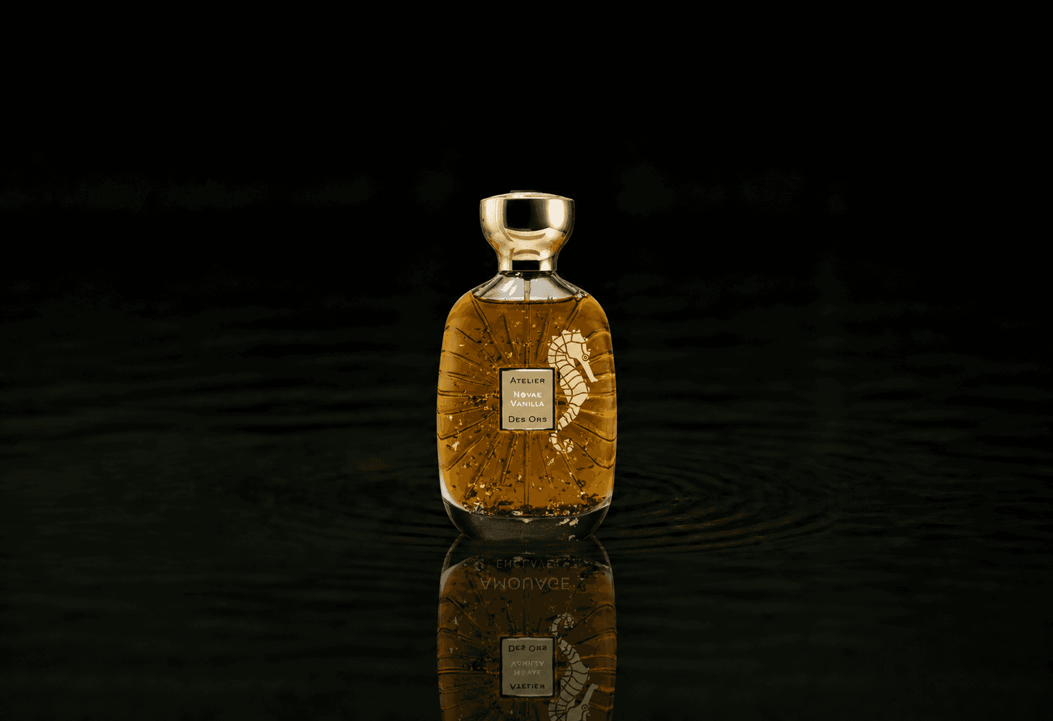 Atelier Des Ors Novae Vanilla fragrance bottle floating above dark water