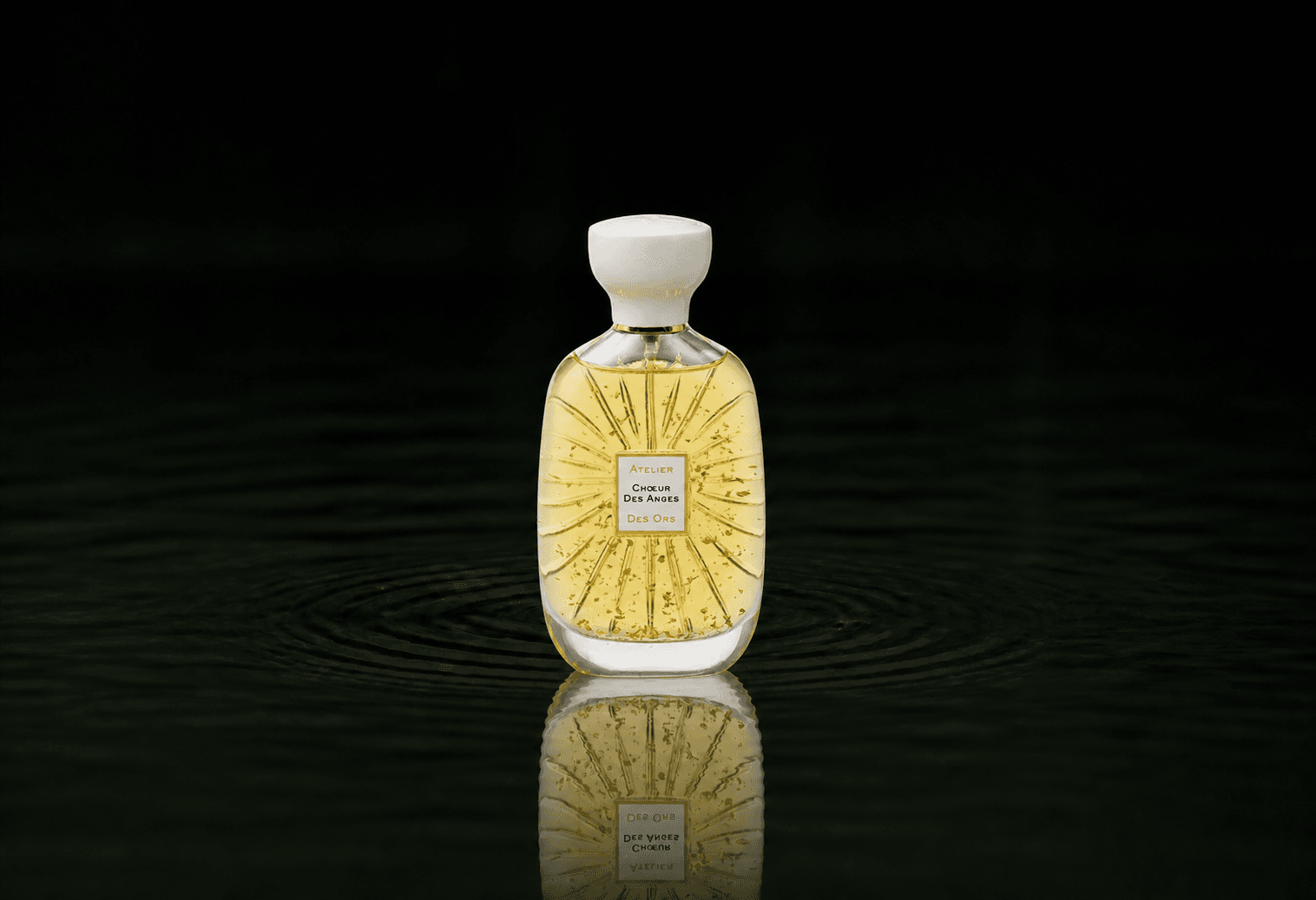 Atelier Des Ors White Collection - Choeur des Anges fragrance bottle floating above dark water