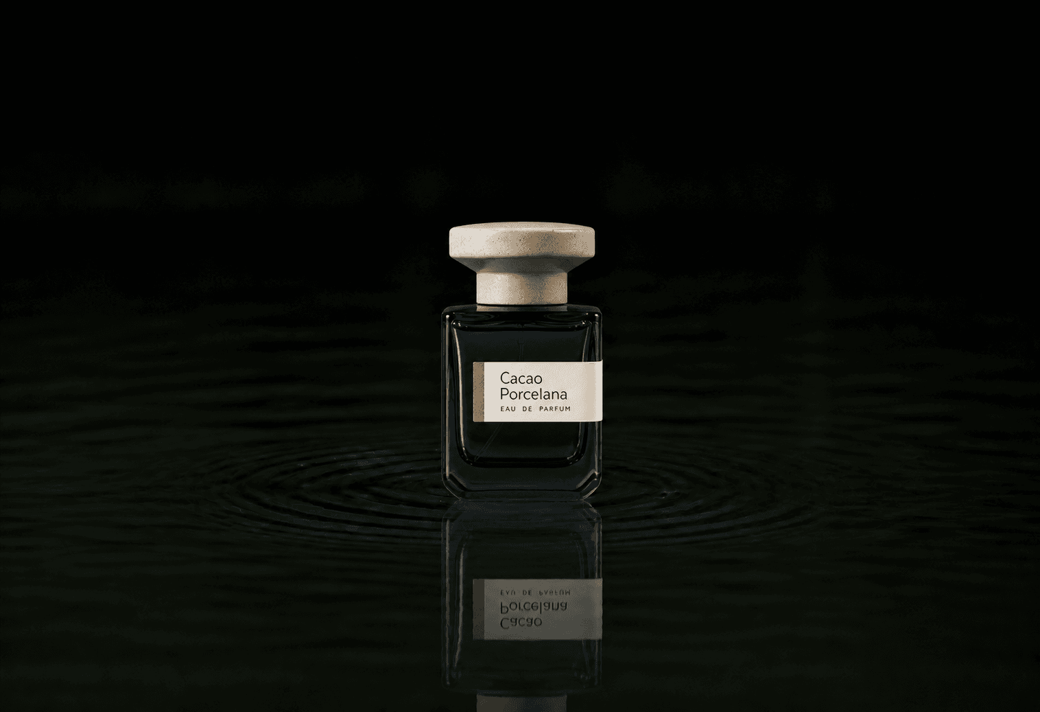 Atelier Materi Cacao Porcelana fragrance bottle floating above dark water