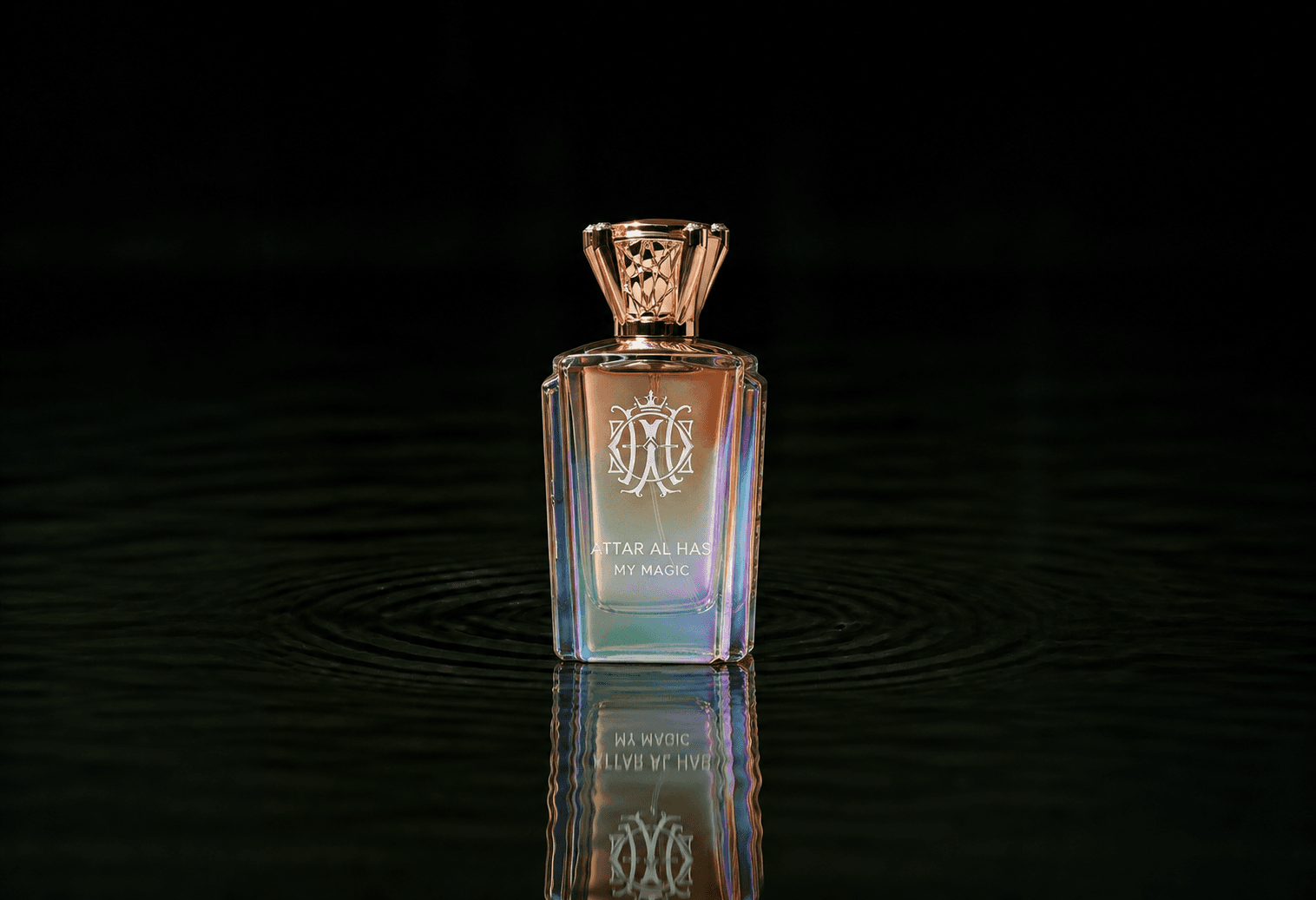 Attar Al Has My Magic fragrance bottle floating above dark water