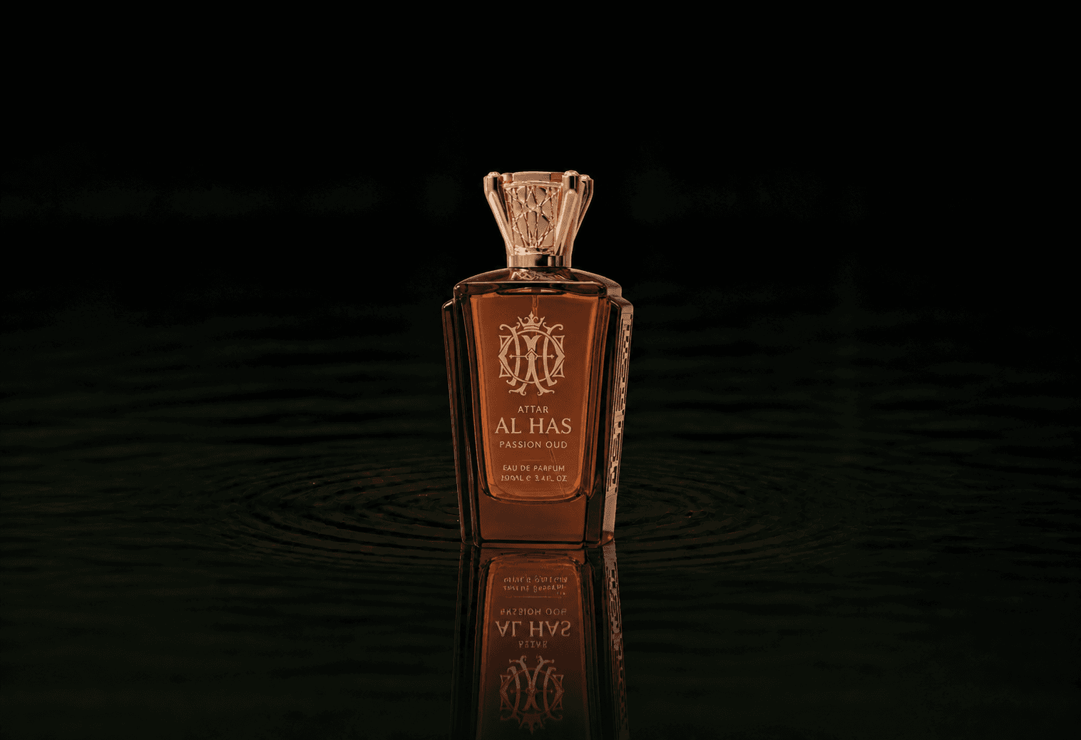 Attar Al Has Passion Oud fragrance bottle floating above dark water