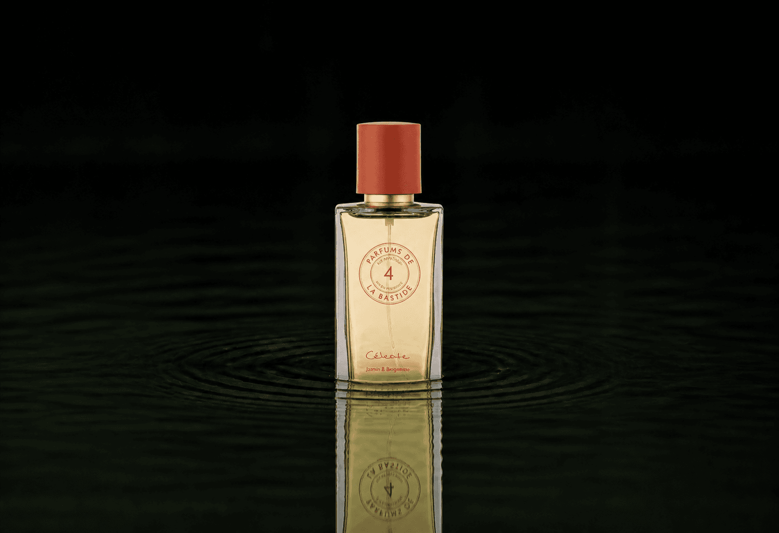 Bastide Celeste fragrance bottle floating above dark water