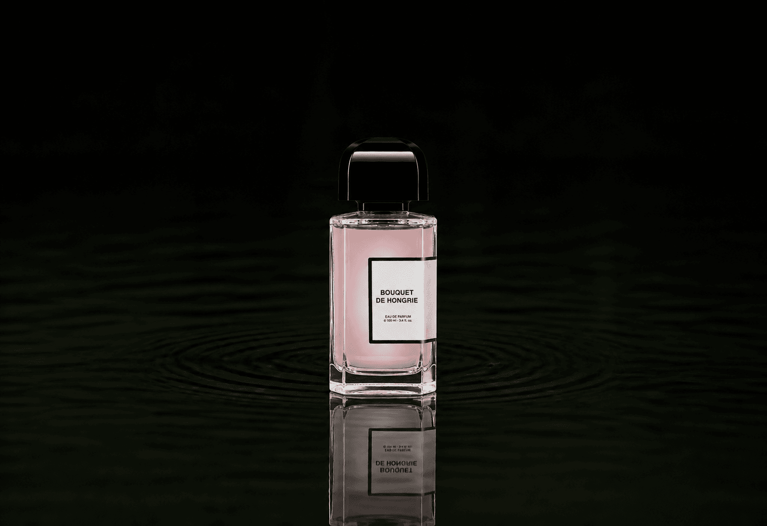 BDK Parfums BDK - Bouquet De Hongrie fragrance bottle floating above dark water