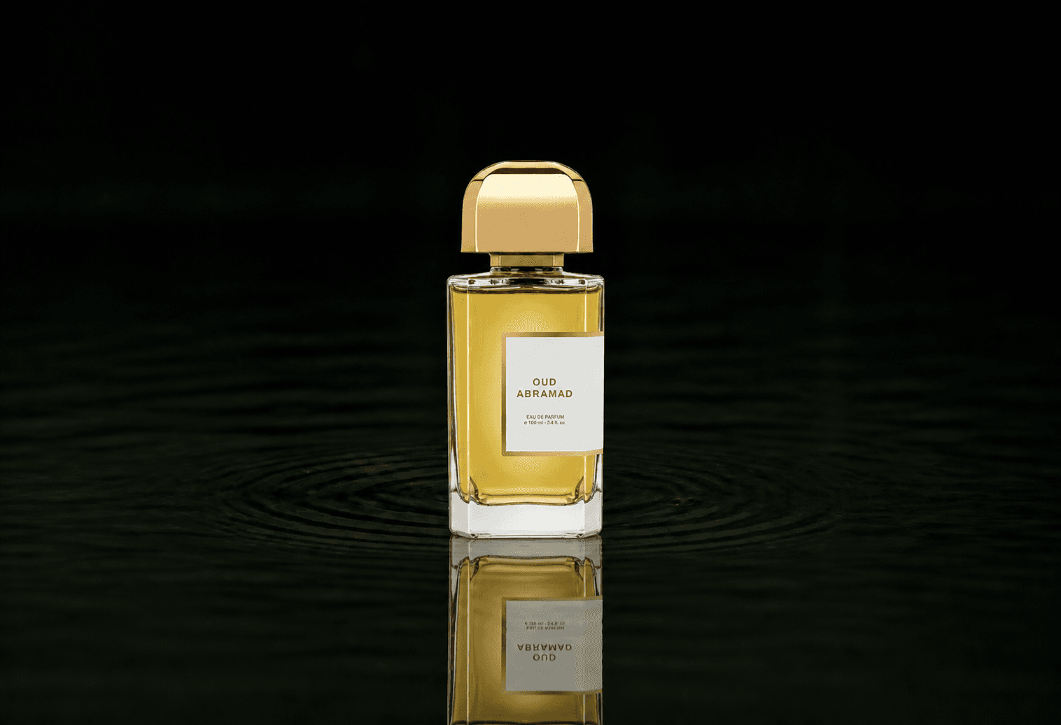 BDK Parfums Oud Abramad fragrance bottle floating above dark water