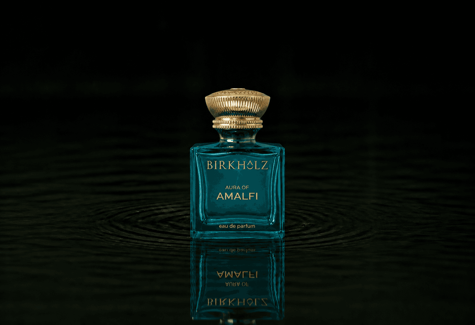 Birkholz Aura of Amalfi fragrance bottle floating above dark water