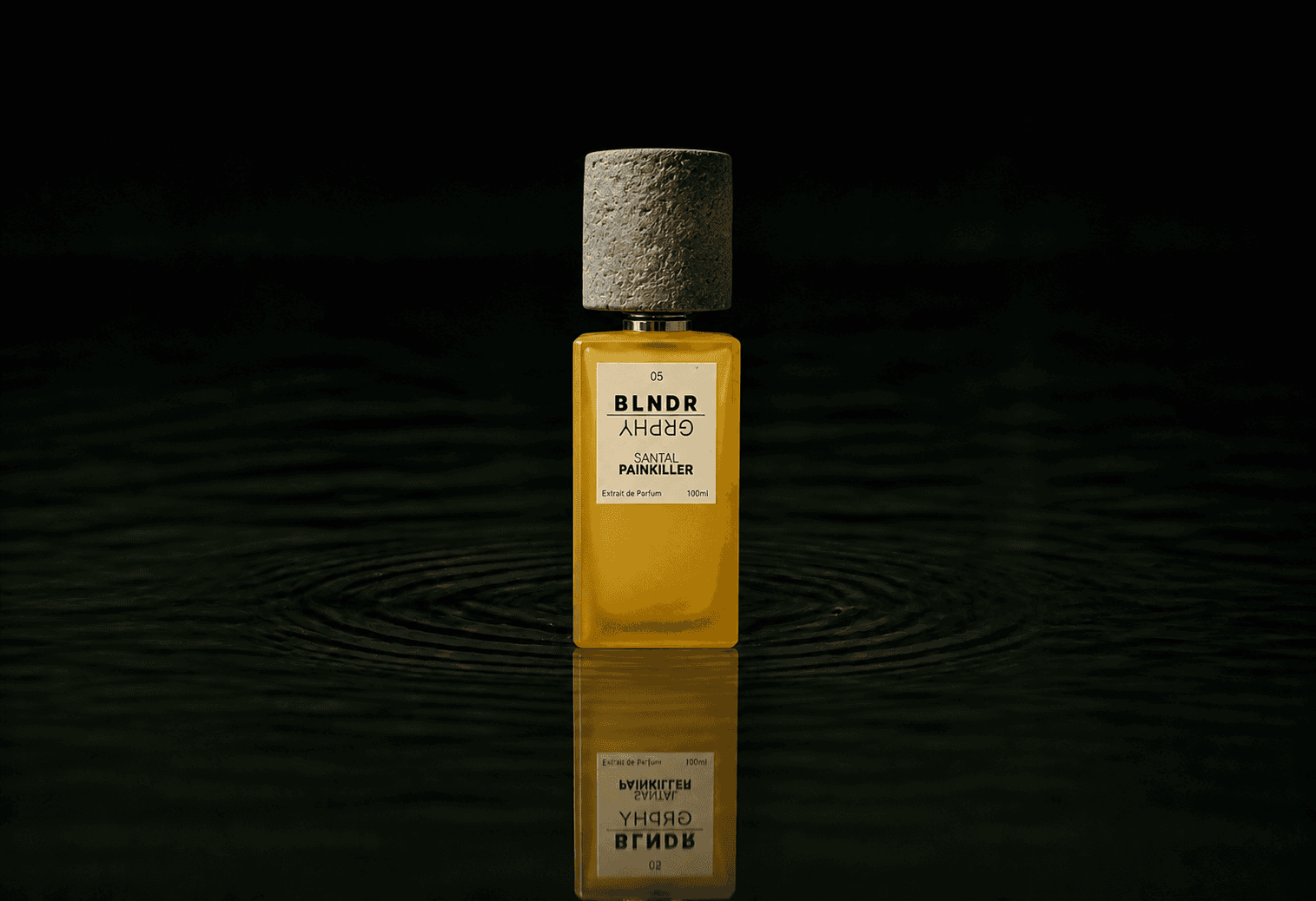 Blndr Grphy 05 Santal Painkiller fragrance bottle floating above dark water