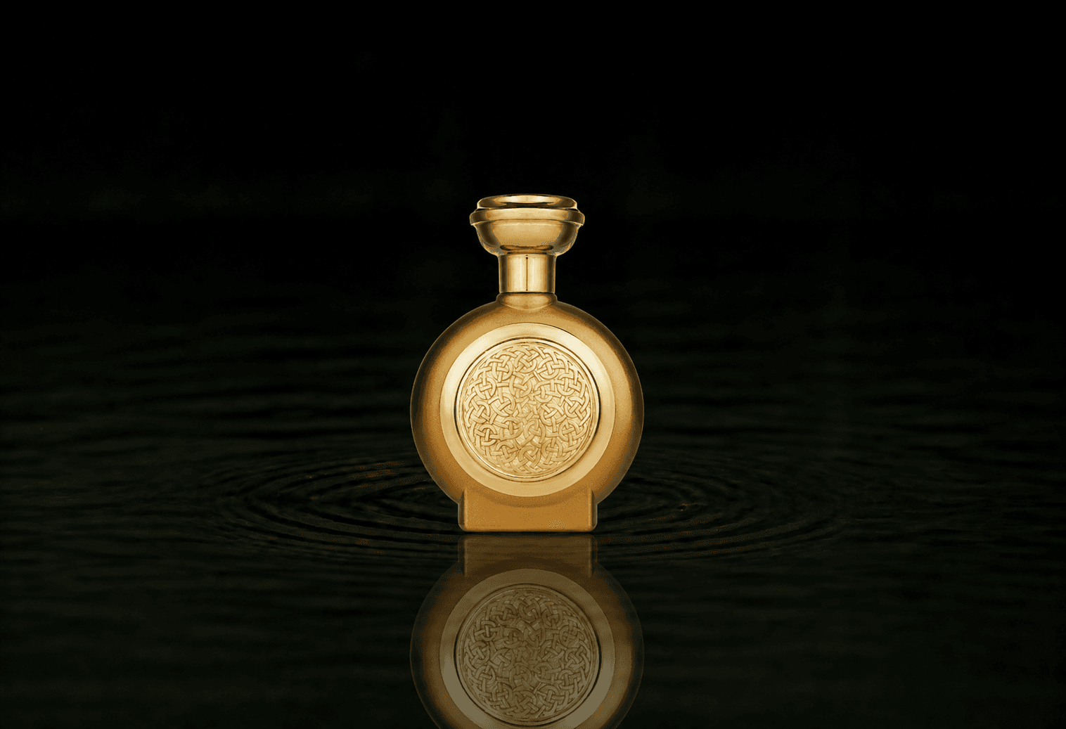 Boadicea The Victorious Consort fragrance bottle floating above dark water