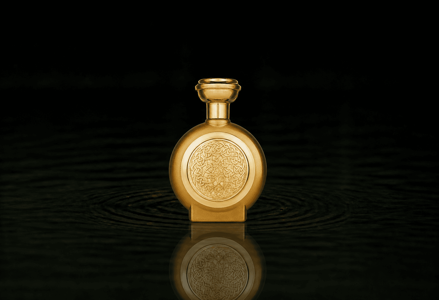 Boadicea The Victorious Empire fragrance bottle floating above dark water