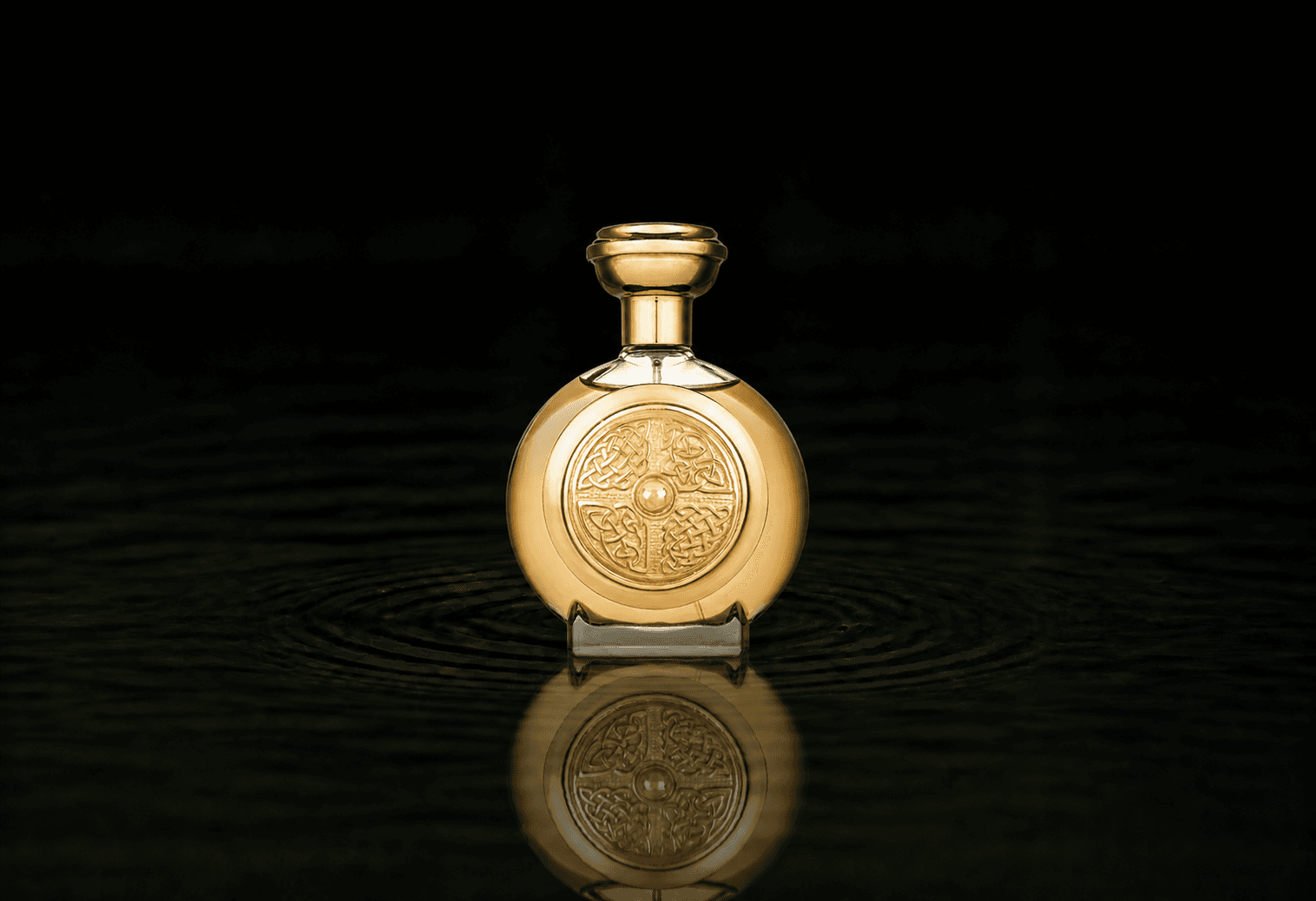 Boadicea The Victorious Lannosea fragrance bottle floating above dark water