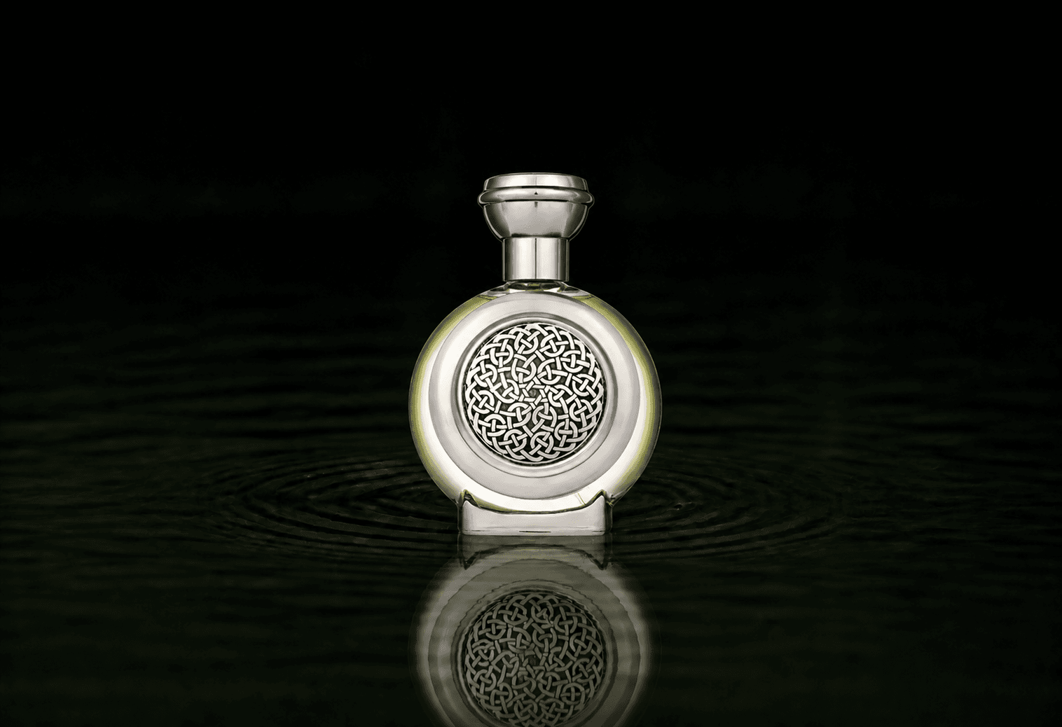 Boadicea The Victorious Regal parfum fragrance bottle floating above dark water