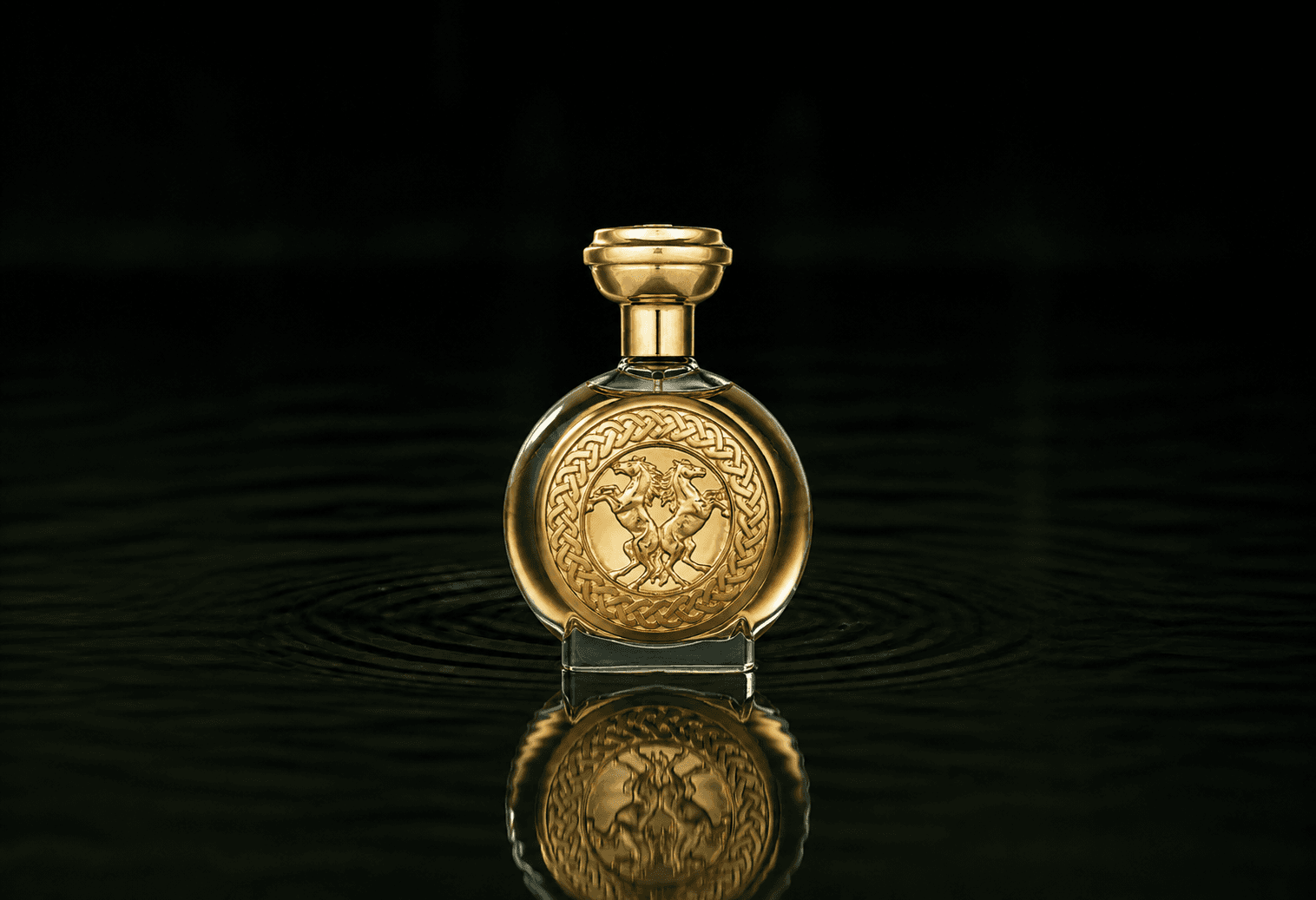 Boadicea The Victorious Valiant parfum fragrance bottle floating above dark water