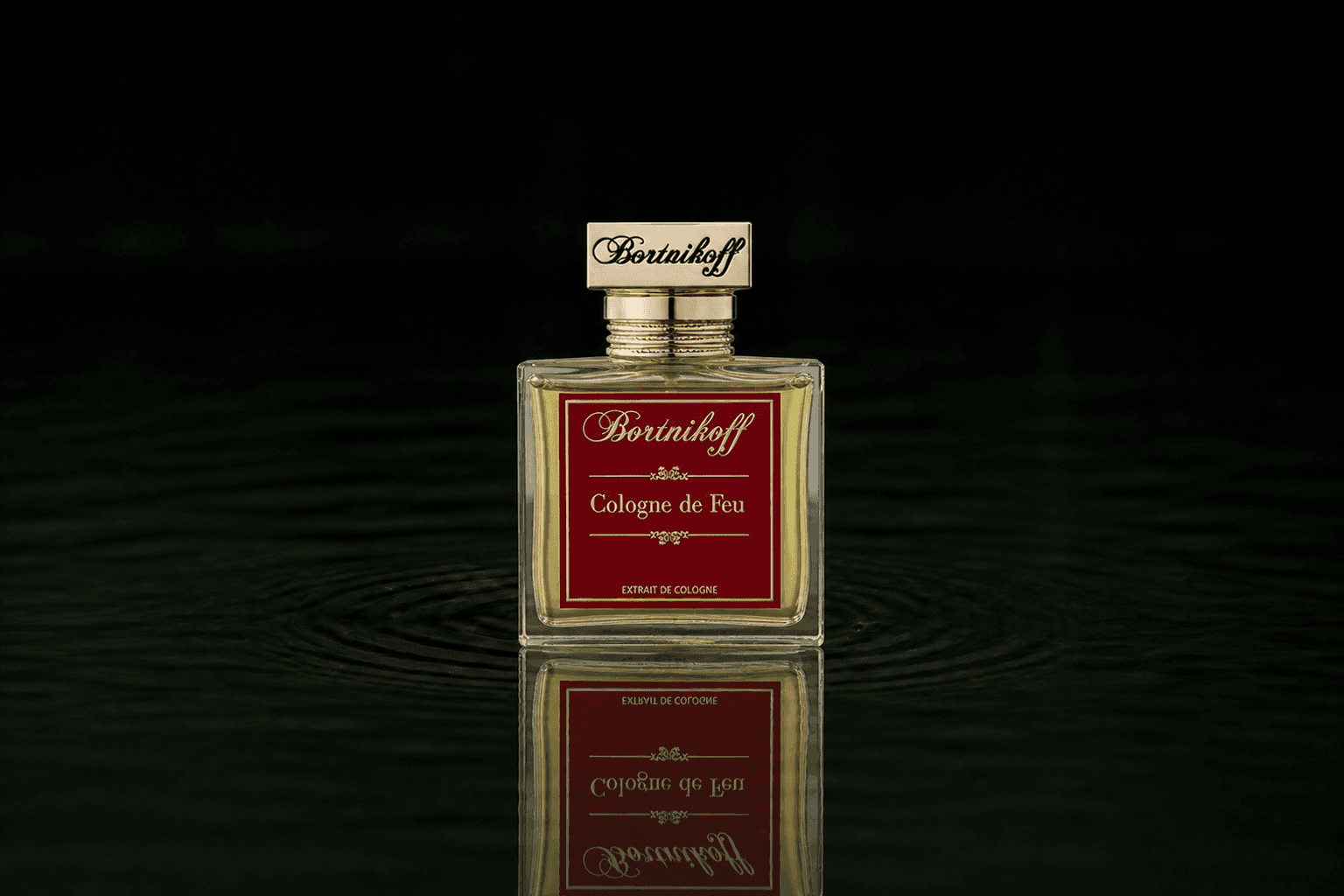Bortnikoff Cologne De Feu fragrance bottle floating above dark water