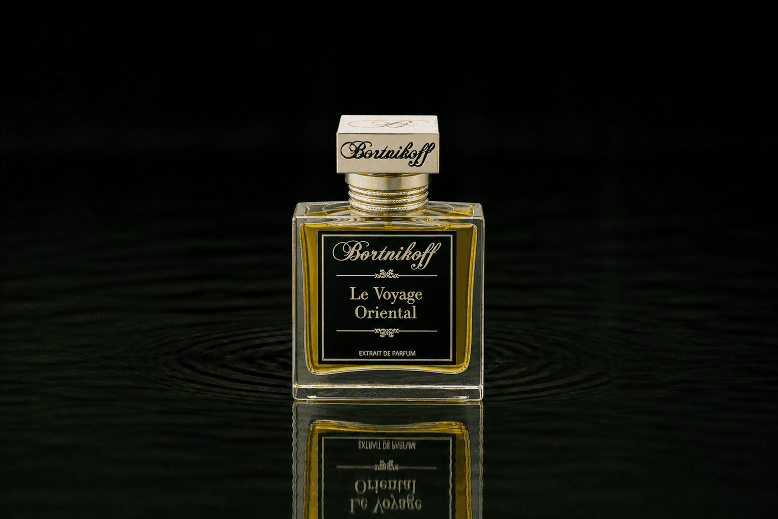 Bortnikoff Le Voyage Oriental fragrance bottle floating above dark water