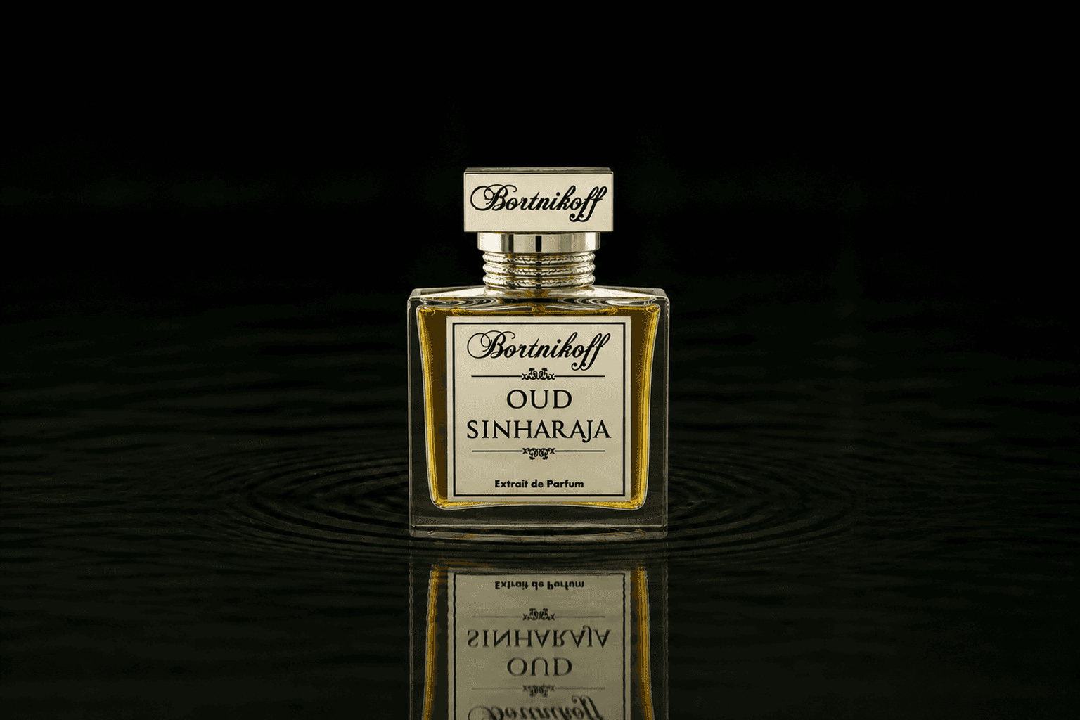 Bortnikoff Oud Sinharaja fragrance bottle floating above dark water