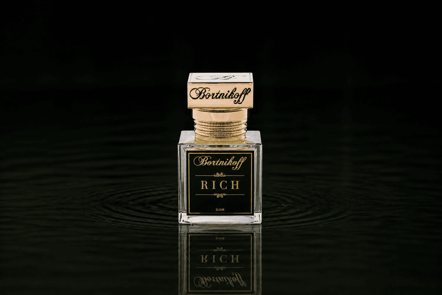 Bortnikoff Rich Elixir fragrance bottle floating above dark water