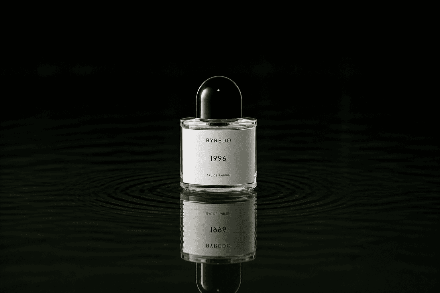 Byredo Parfums - 1996 fragrance bottle floating above dark water
