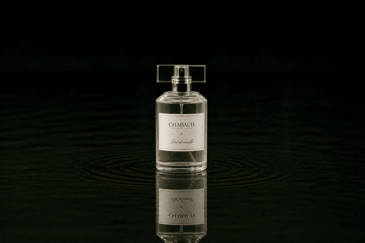 Chabaud Lait De Vanille fragrance bottle floating above dark water