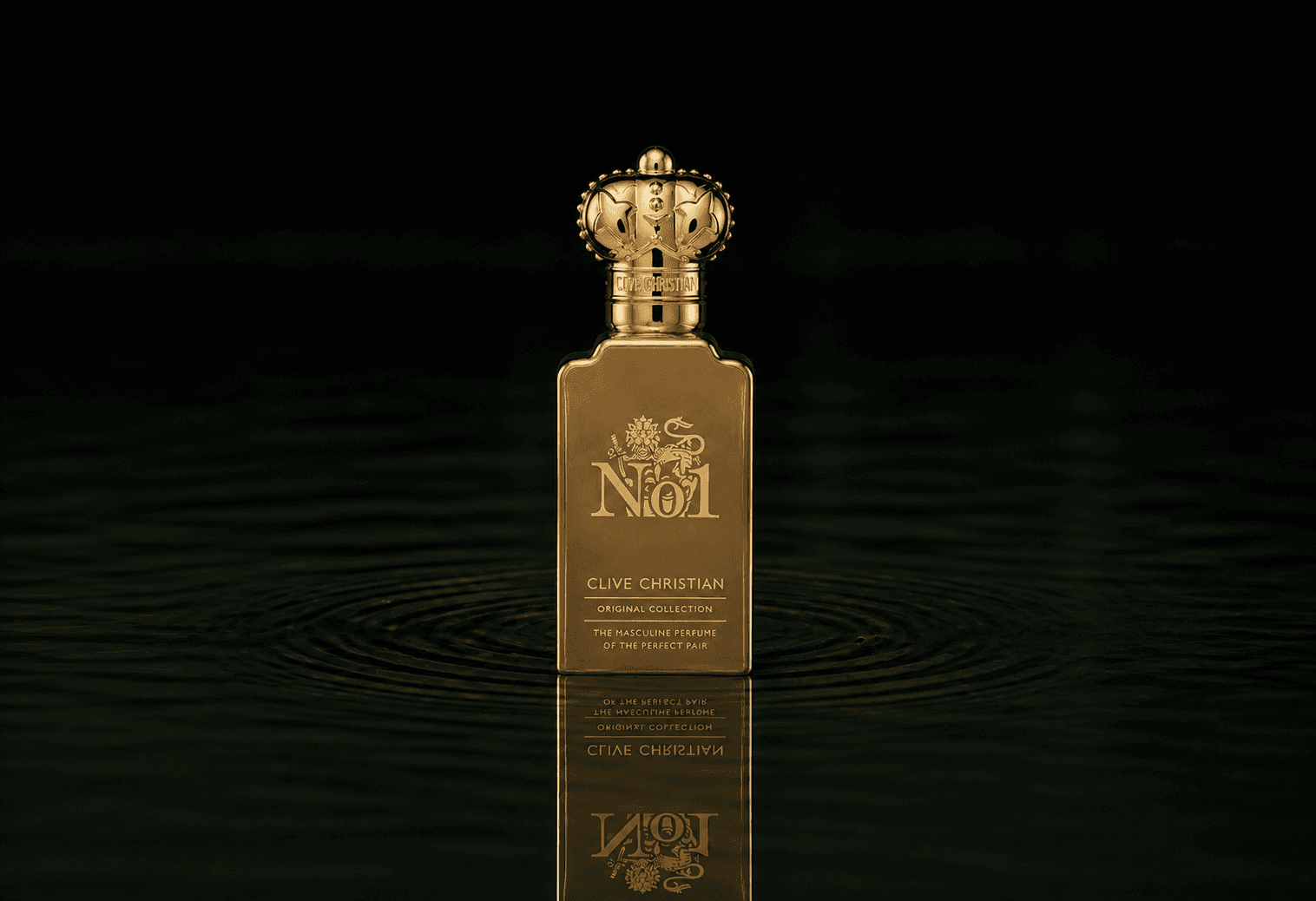 Clive Christian No1 Masculine fragrance bottle floating above dark water