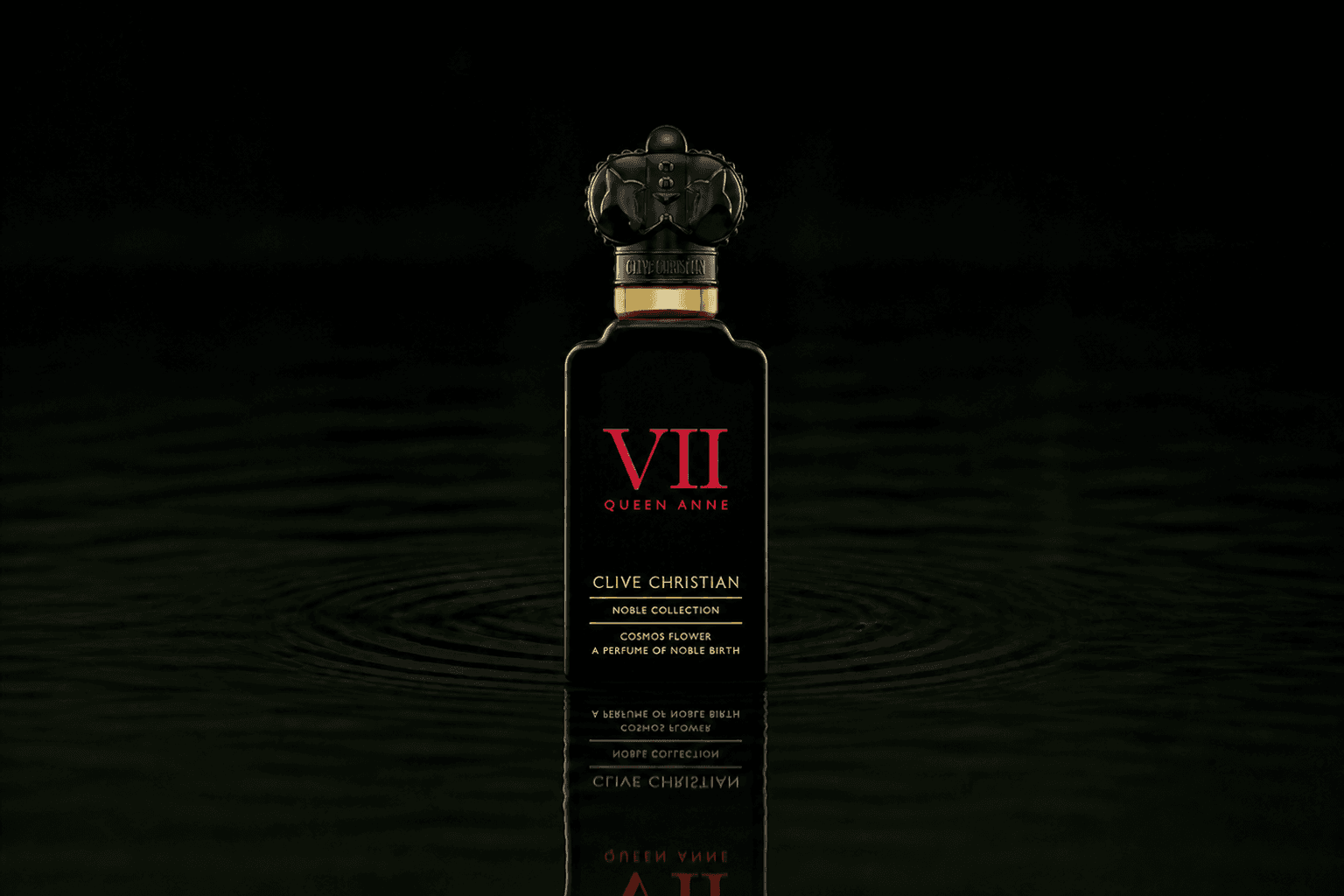 Clive Christian Noble VII Cosmos Flower fragrance bottle floating above dark water
