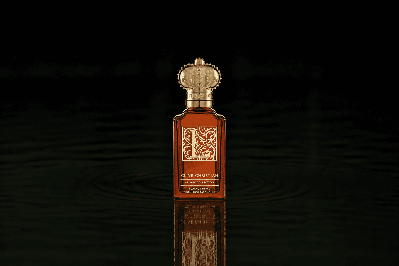 Clive Christian Private Collection L Floral Chypre fragrance bottle floating above dark water