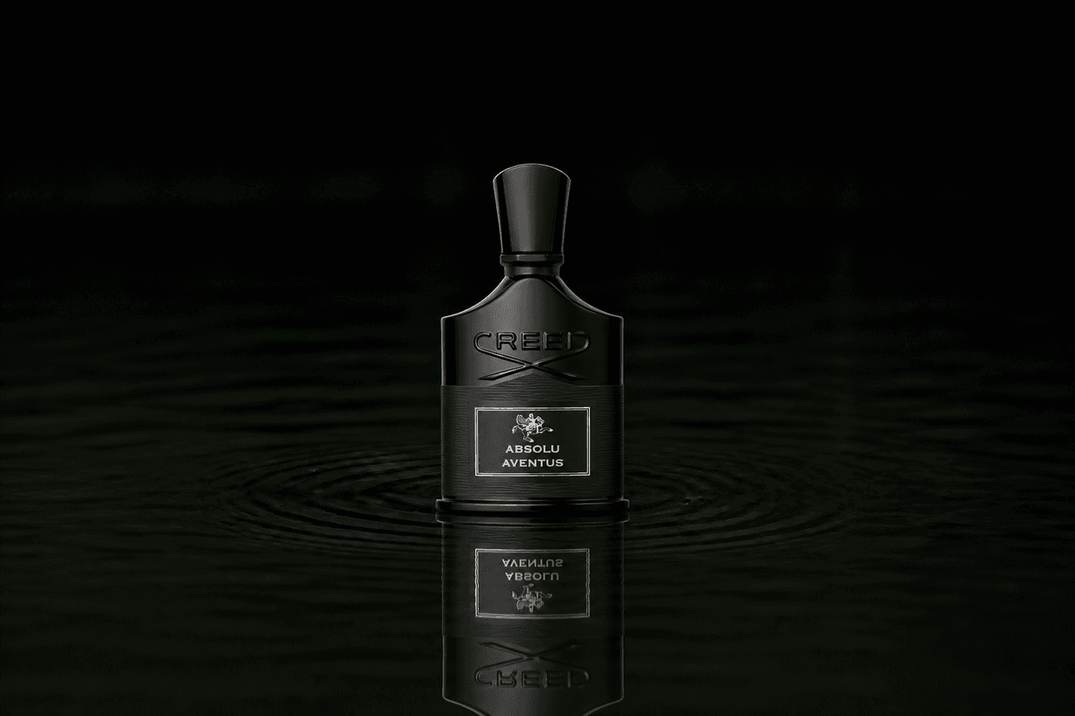 Creed Aventus Absolu fragrance bottle floating above dark water