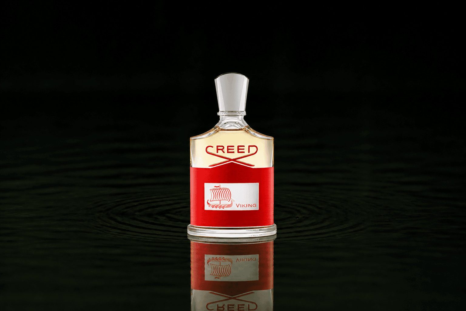 Creed Viking fragrance bottle floating above dark water