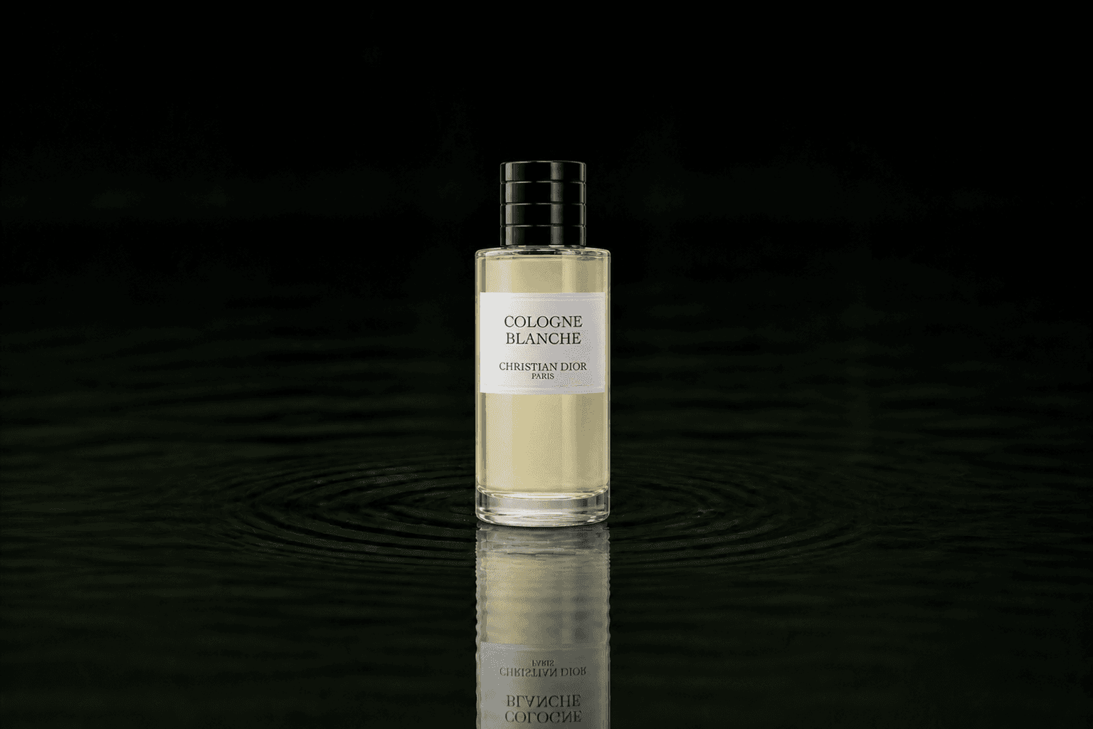 Dior Christian Dior - Cologne Blanche fragrance bottle floating above dark water