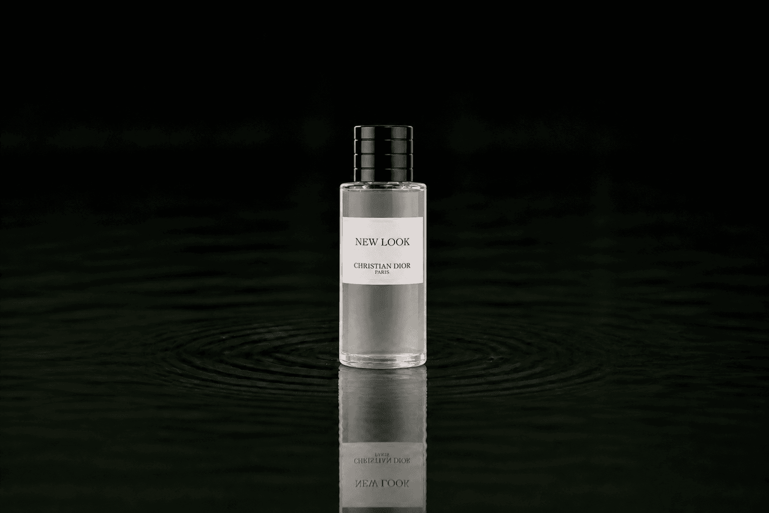 Dior Christian Dior - New Look fragrance bottle floating above dark water