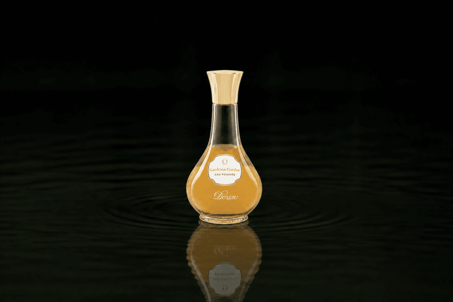 Dorin Paris Gardenia Garden Eau Poudree fragrance bottle floating above dark water