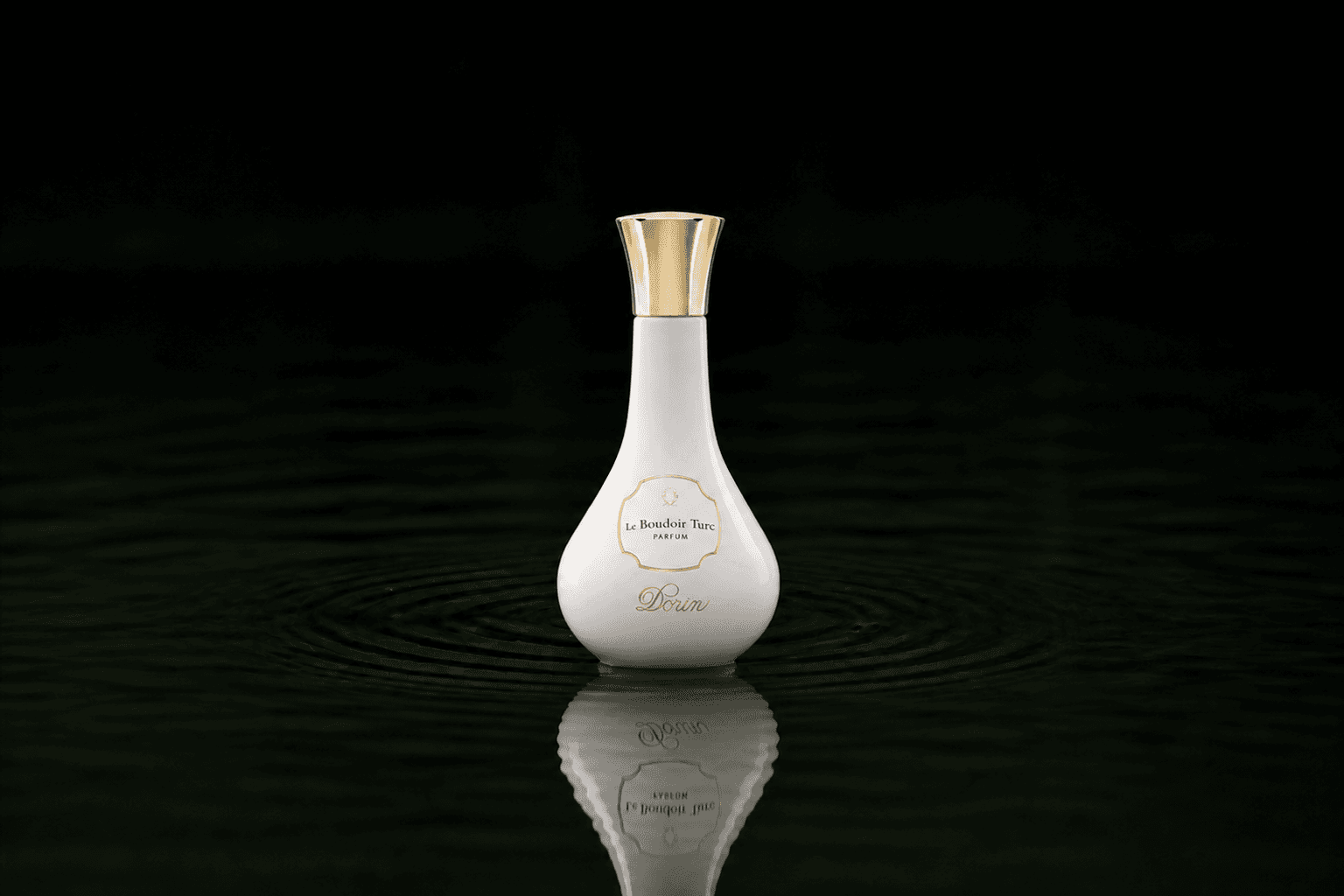 Dorin Paris Le Boudoir Turc fragrance bottle floating above dark water