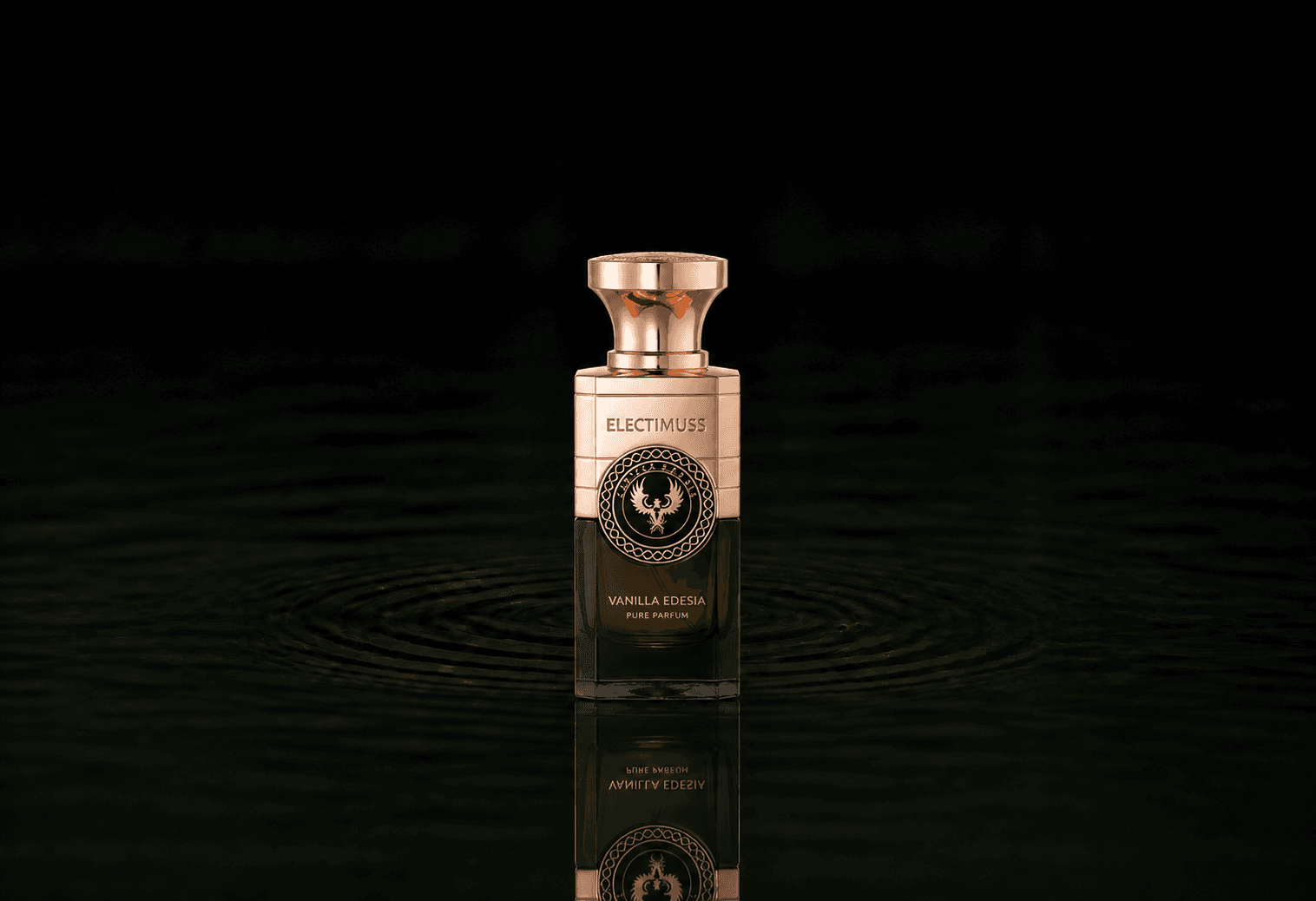 Electimuss Vanilla Edesia Pure Parfum fragrance bottle floating above dark water