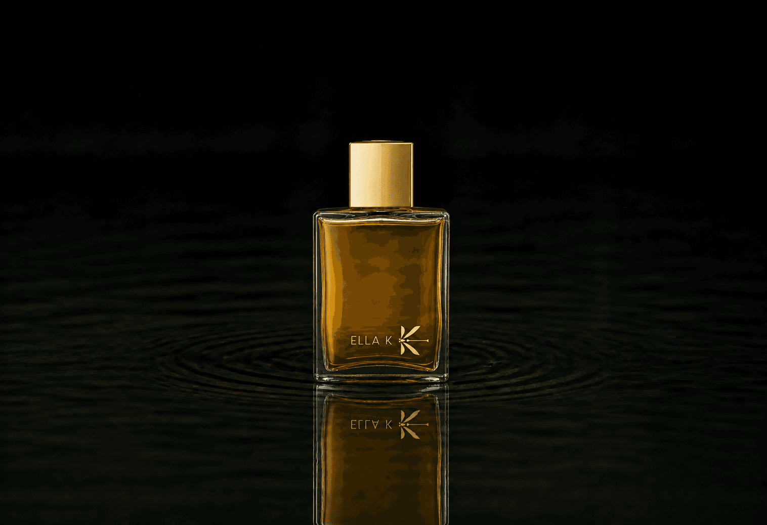Ella K Harmattan fragrance bottle floating above dark water