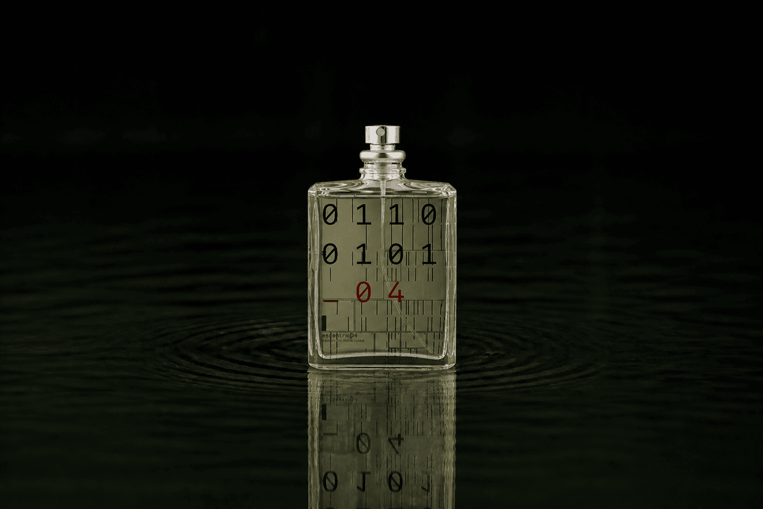Escentric Molecules Escentric 04 fragrance bottle floating above dark water
