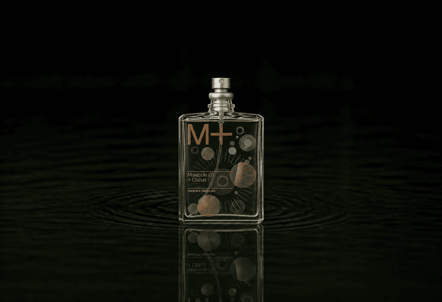 Escentric Molecules Molecule 01 + Cistus fragrance bottle floating above dark water